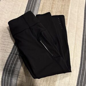 Women’s black Rainier Athleta leggings. Size medium.